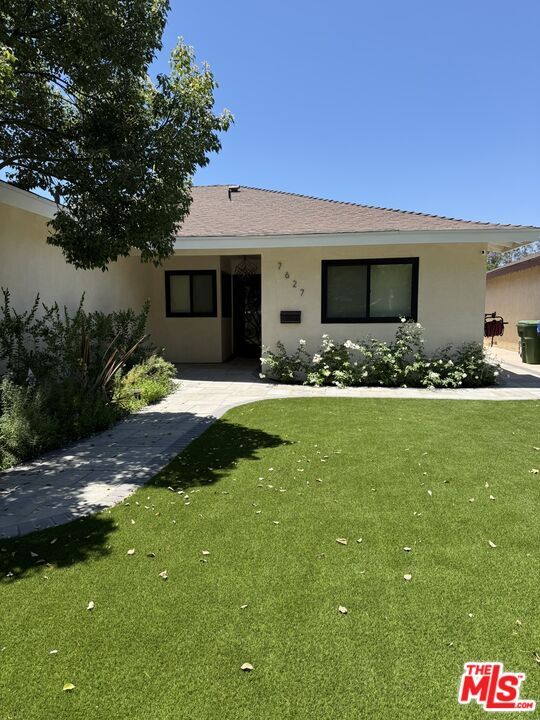 Property Photo: 7627 Encino Ave CA 91325