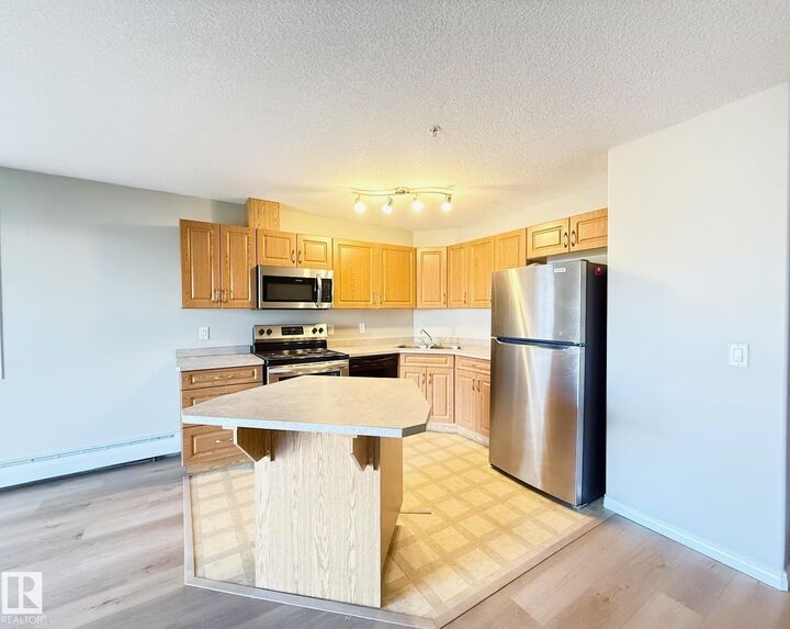 Property Photo:  9945 167 Street NW 312  AB T5P 0K5 