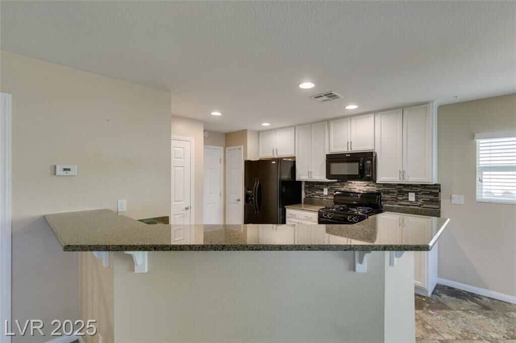 Property Photo:  9918 Baron Coast Street  NV 89178 
