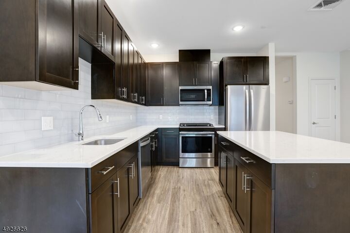 Property Photo: 60 Passaic Ave 26 NJ 07004