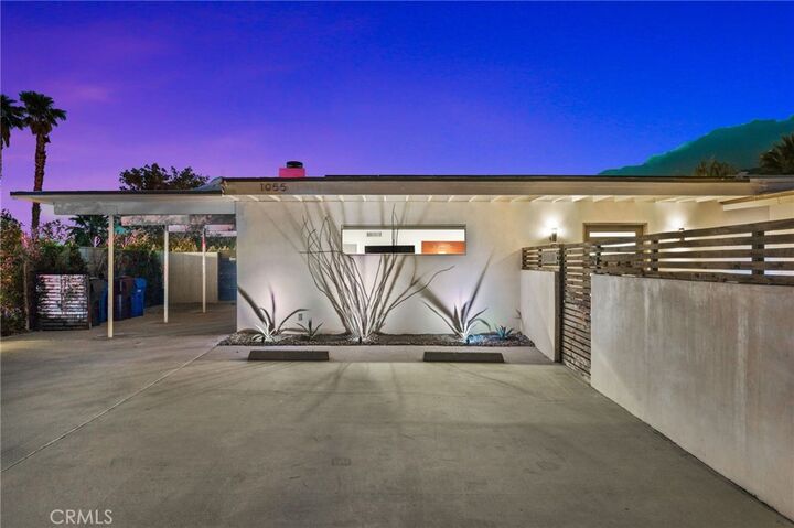 Property Photo:  1055 E Racquet Club  CA 92262 