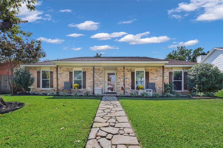 Property Photo: 4902 Freeport Drive TX 75043