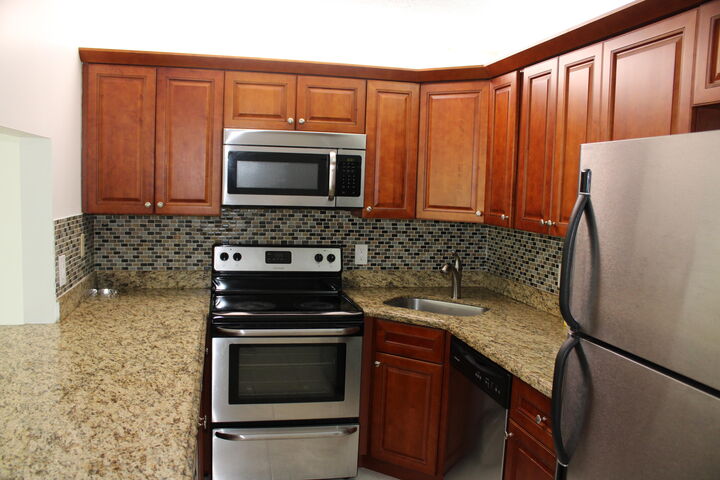 Property Photo:  1006 Green Pine Boulevard H2  FL 33409 