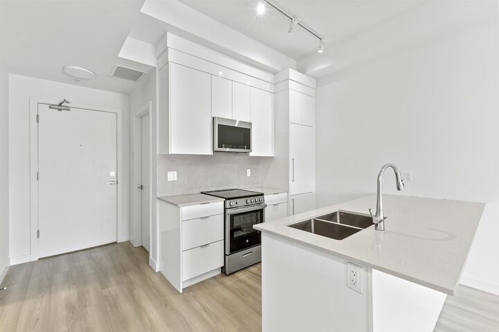 Property Photo: 11913 Burnett Street 510 BC V2X 4N1
