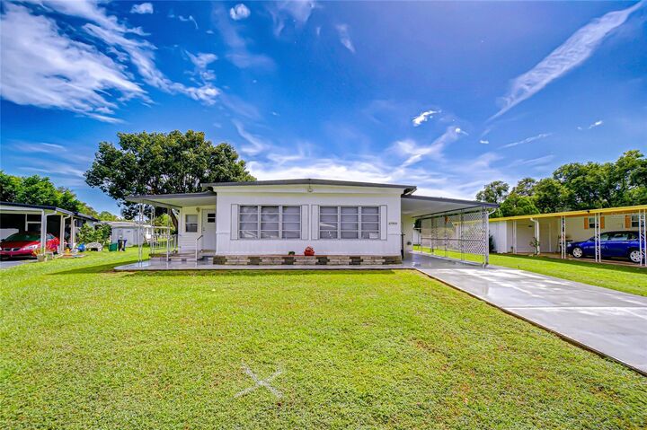 Property Photo:  37930 Date Palm Drive  FL 33542 