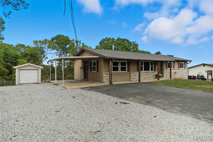 Property Photo: 5009 Countryside Drive MO 63052