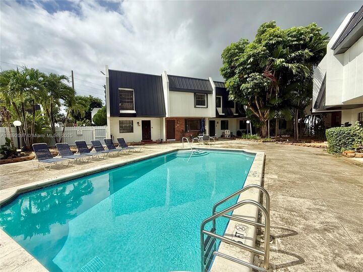 Property Photo:  5555 Ludlam Rd 47  FL 33155 