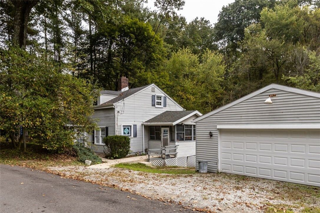 Property Photo:  5879 Steele Rd  PA 15668 