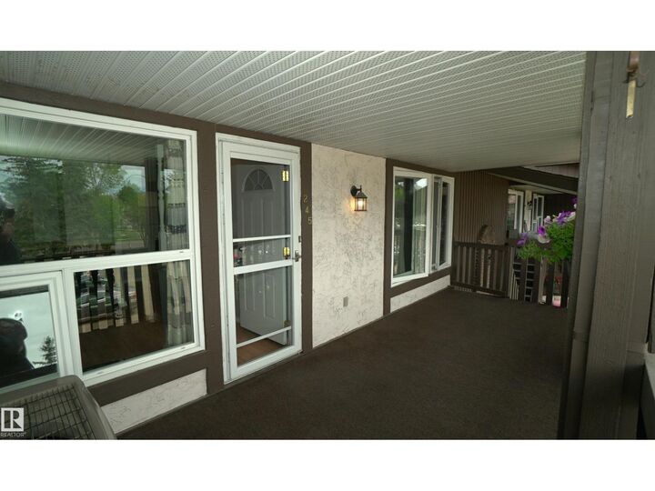 Property Photo:  245 Surrey Gardens NW  AB T5T 1Z3 