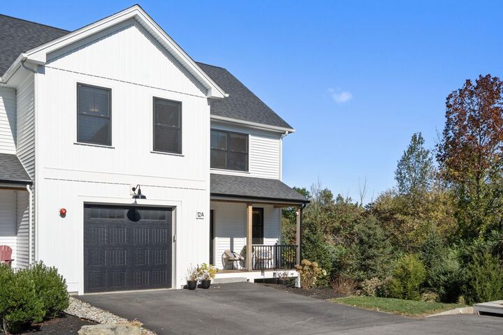 Property Photo:  12 Founders Square  NH 03840 