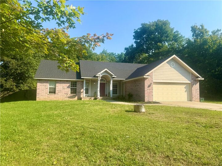 Property Photo: 100 W Greenwood Street AR 72701