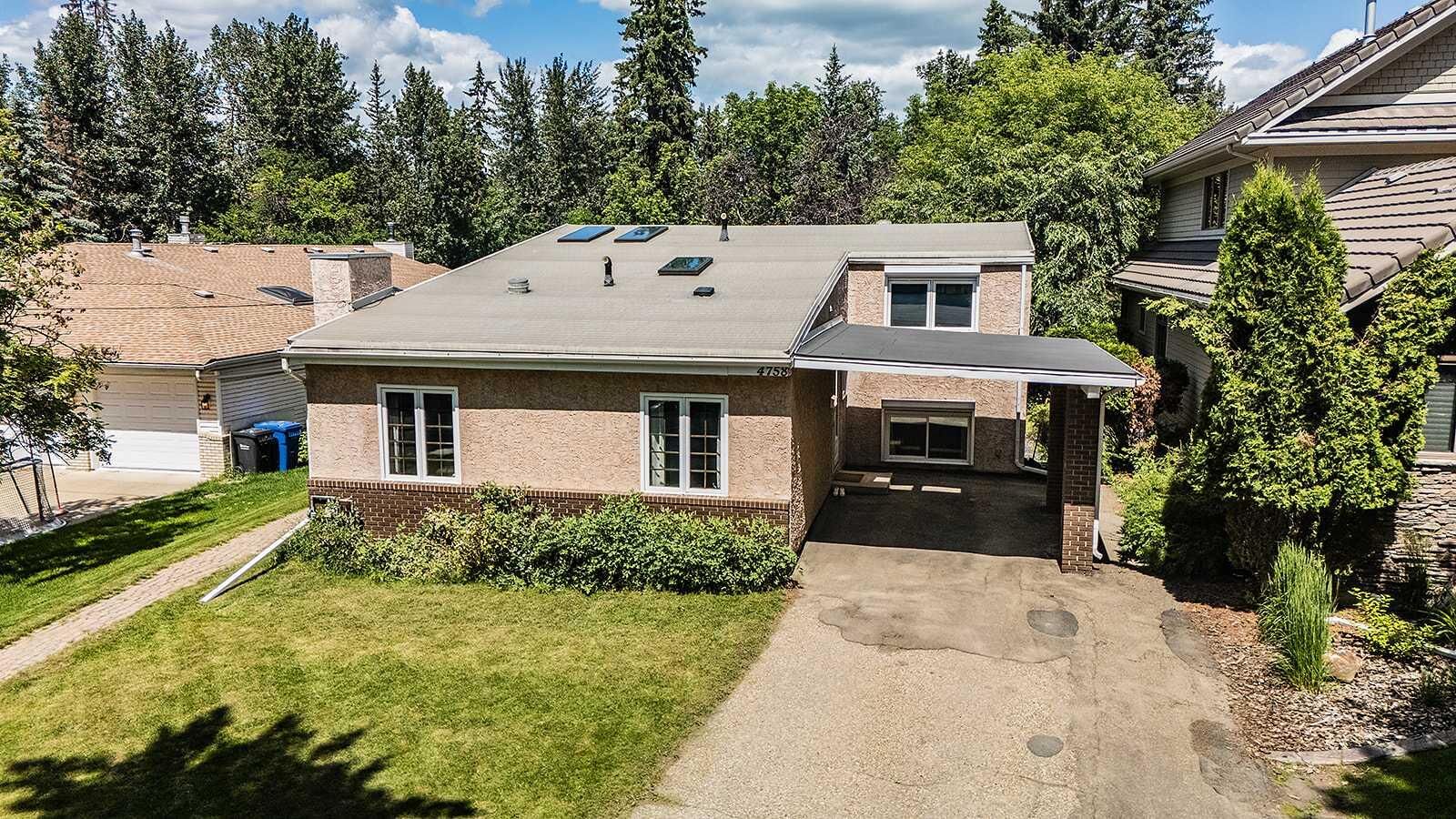 Property Photo:  4758 56 Street  AB T4N 2K3 