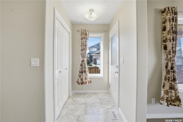 Property Photo: 602 Kolynchuk Court SK S7T 0W1