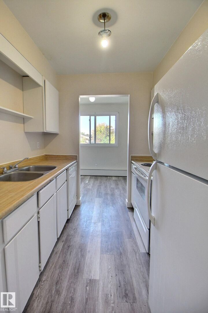 Property Photo: 7203 171 Street NW 304 AB T5T 2R1