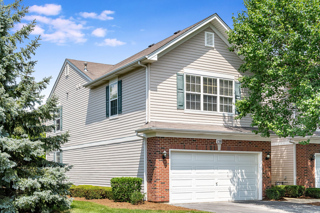 Property Photo: 158 Concord Drive S 158 IL 60543