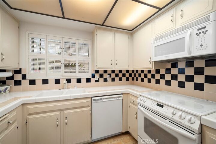 Property Photo:  3241 San Amadeo 1E  CA 92637 