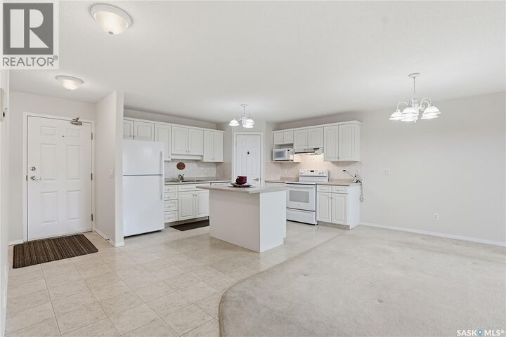 Property Photo: 210 934 Heritage View SK S7H 5R9