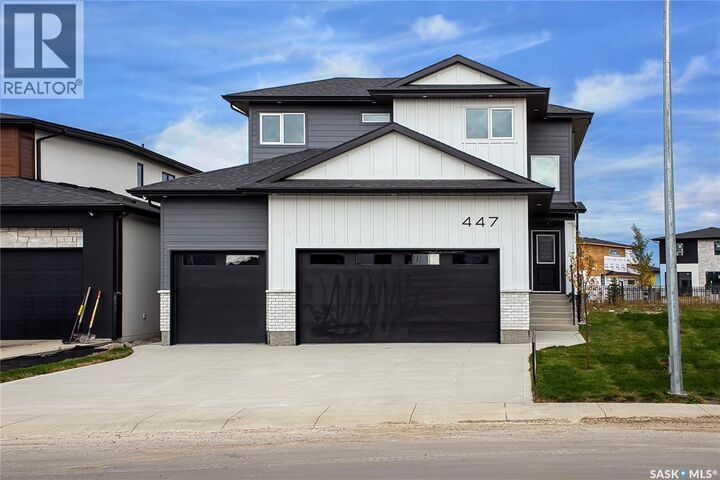 Property Photo: 447 Woolf Bend SK S7W 1E4