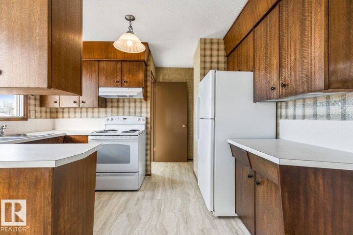 Property Photo:  14223 116 Street NW  AB T5X 1M9 