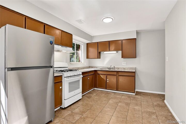 Property Photo: 489 Toledo Street CO 80011
