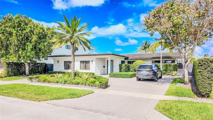 Property Photo: 12855 Maple Rd FL 33181
