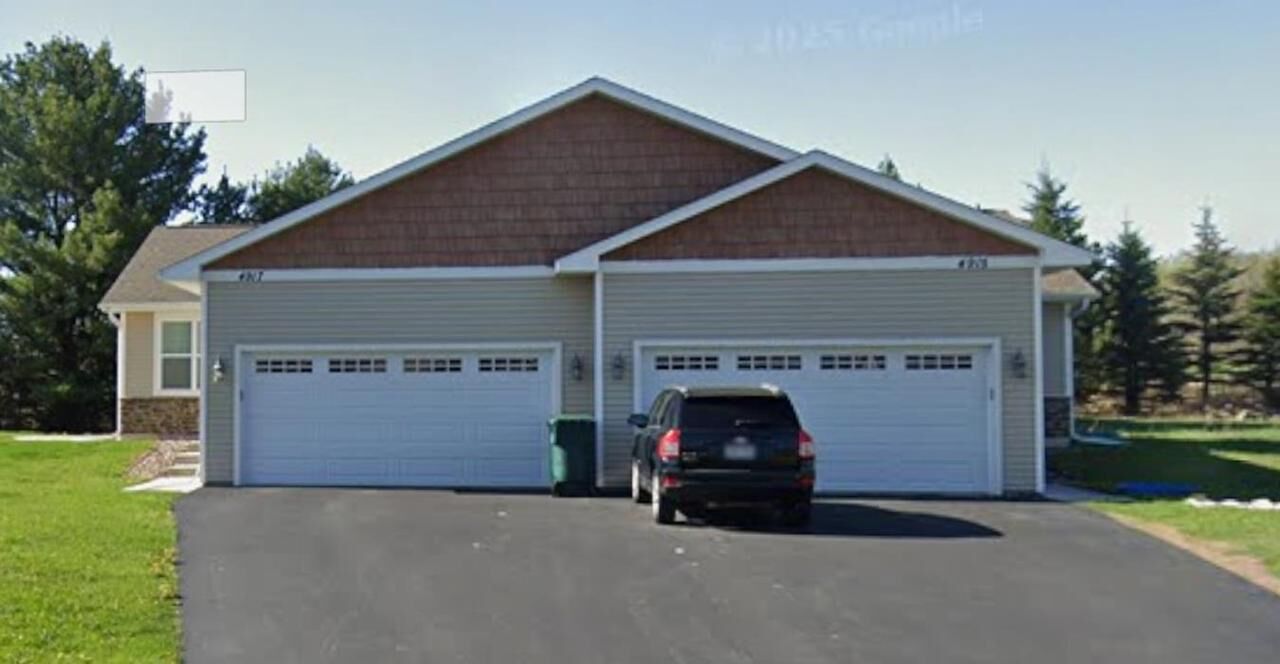 Property Photo:  4917-4915 Annabelle Court  WI 54476 