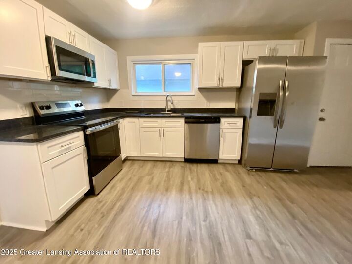 Property Photo:  626 Tisdale Avenue  MI 48910 