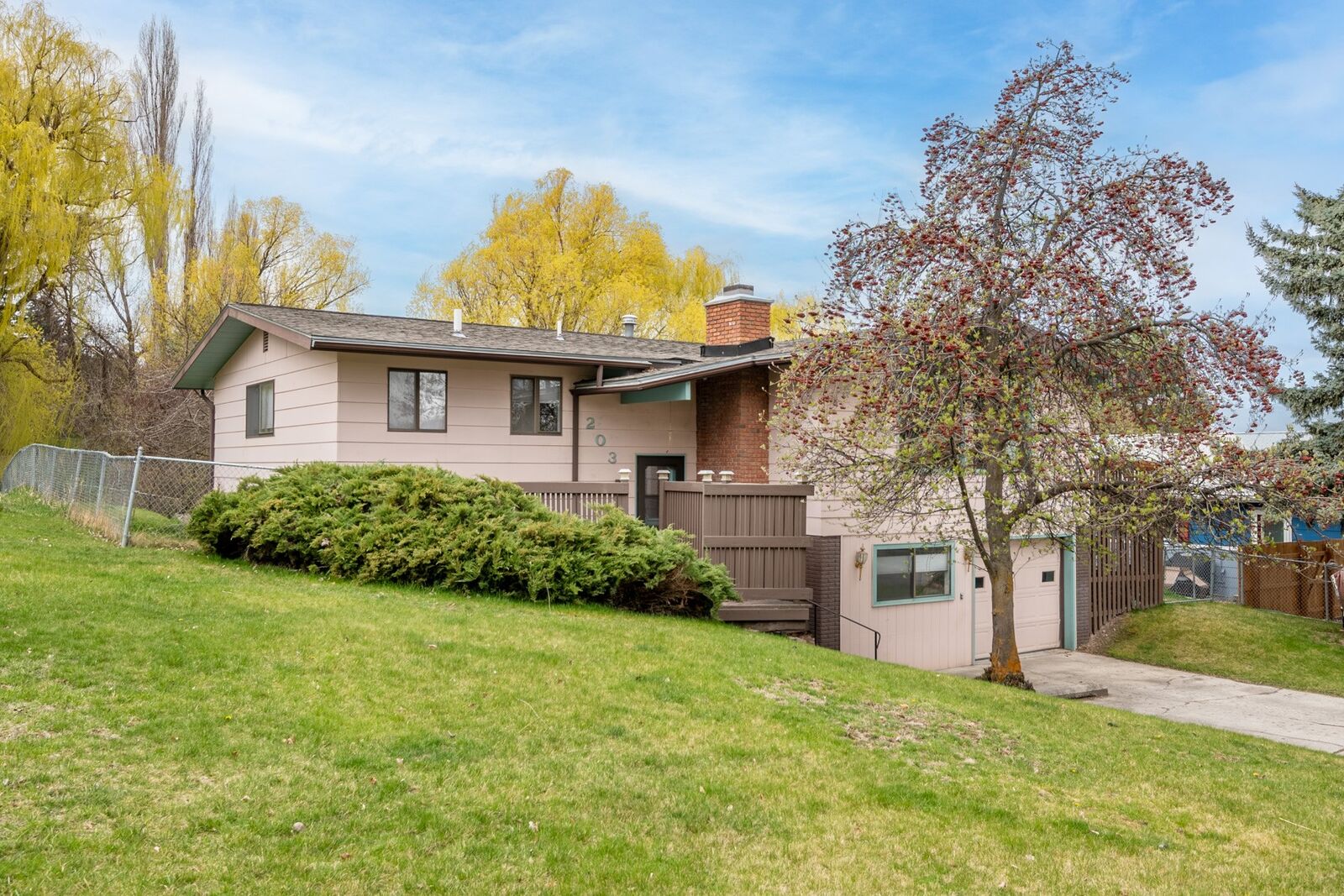 Property Photo:  203 High Park Way  MT 59803 