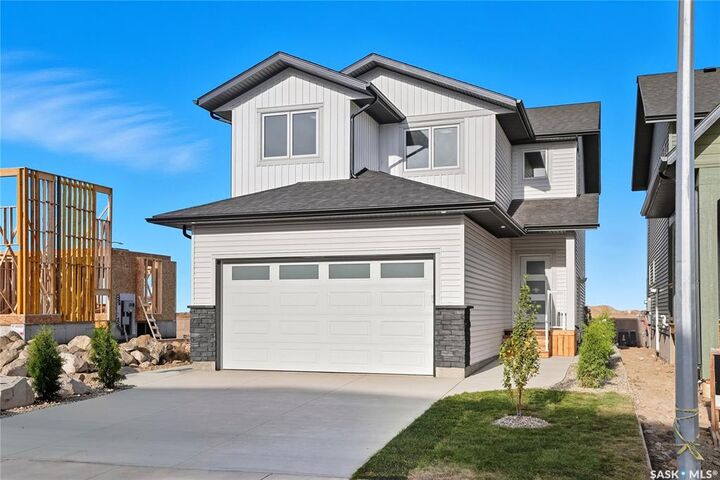 Property Photo:  311 Sharma Crescent  SK S7W 1L1 