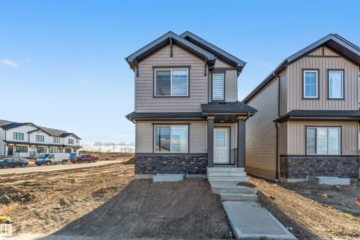 Property Photo: 1005 Aster Boulevard NW AB T6T 2W8