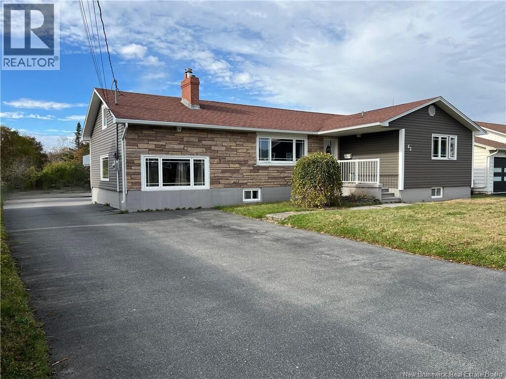Property Photo: 63 Buena Vista Avenue NB E2M 2S7