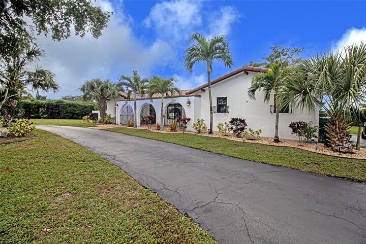 Property Photo:  11035 NW 26th Dr  FL 33065