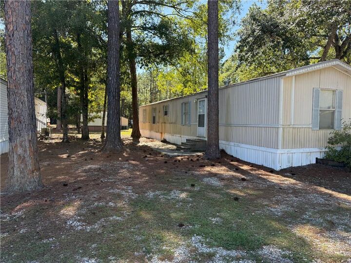 Property Photo:  64096 Mangano Road 158  LA 70452
