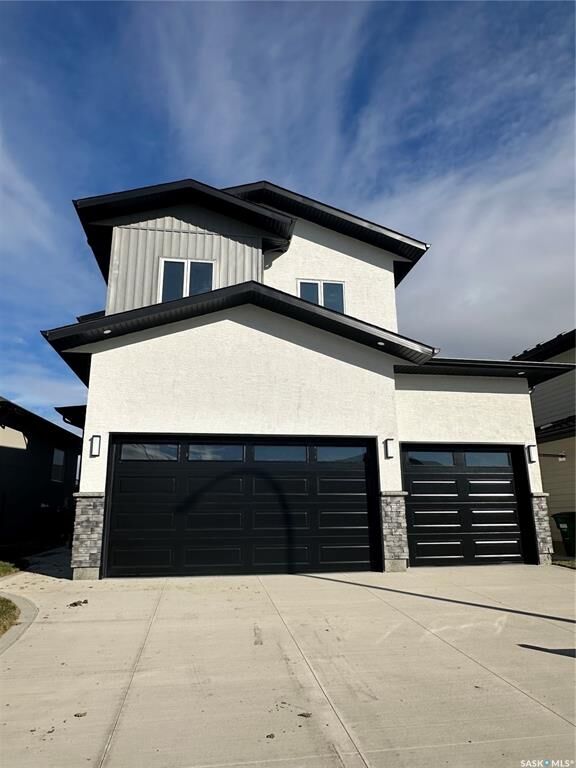 Property Photo: 147 Woolf Bend SK S7W 0L6