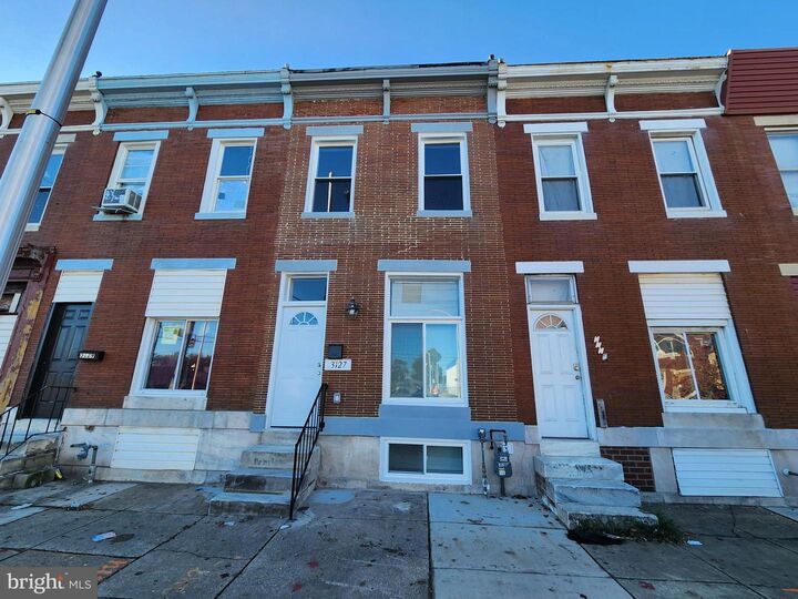 Property Photo:  3127 E Monument Street  MD 21205