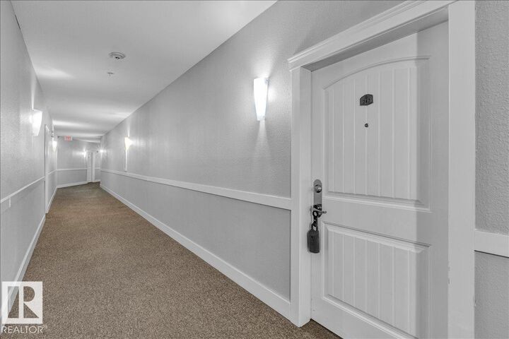 Property Photo: 2096 Blackmud Creek Drive SW 242 AB T6W 0G1