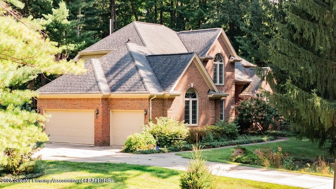 Property Photo:  4710 Wellington Drive  MI 48864 