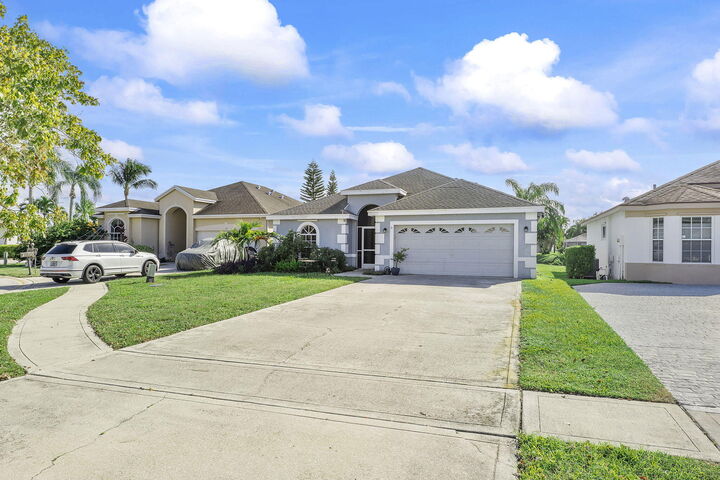 Property Photo: 107 Meadowlands Drive FL 33411