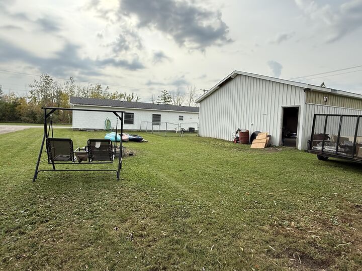 Property Photo:  990 W State Street  MI 49721 