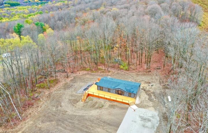 Property Photo:  6864 Simmons Road  NY 14731