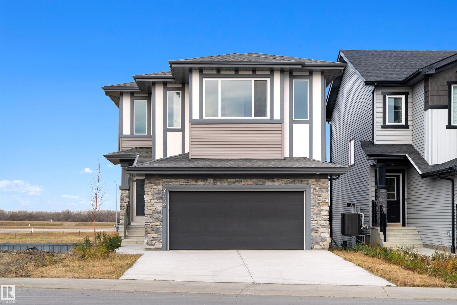 Property Photo:  9332 183 Avenue NW  AB T5Z 0V1