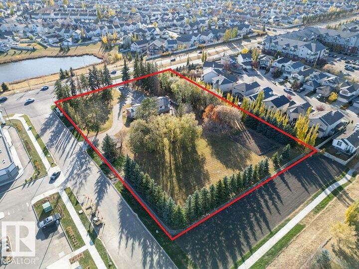 Property Photo:  7550 Ellerslie Road SW  AB T6X 1A3