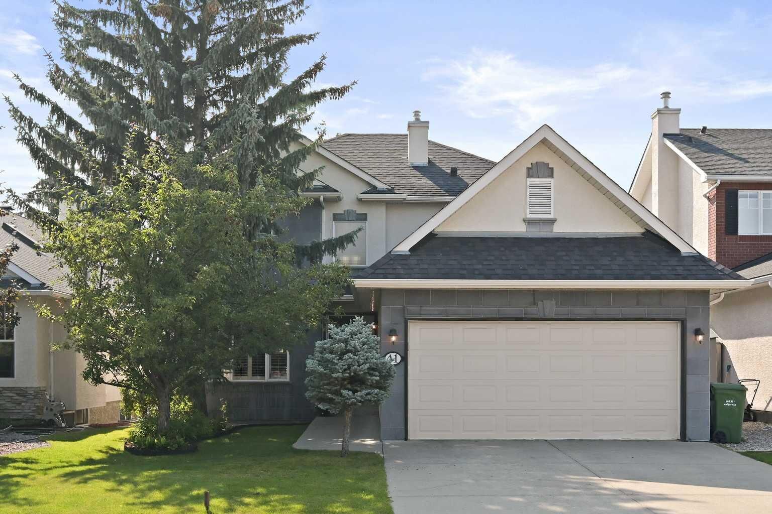 Property Photo:  41 Strathridge Crescent SW  AB T3H 3R9