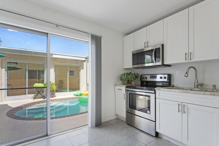 Property Photo:  216 S Ocean Breeze #1 Poolside  FL 33460