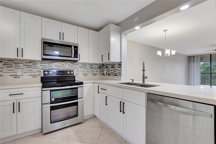 Property Photo:  8592 W Sunrise Blvd 317  FL 33322