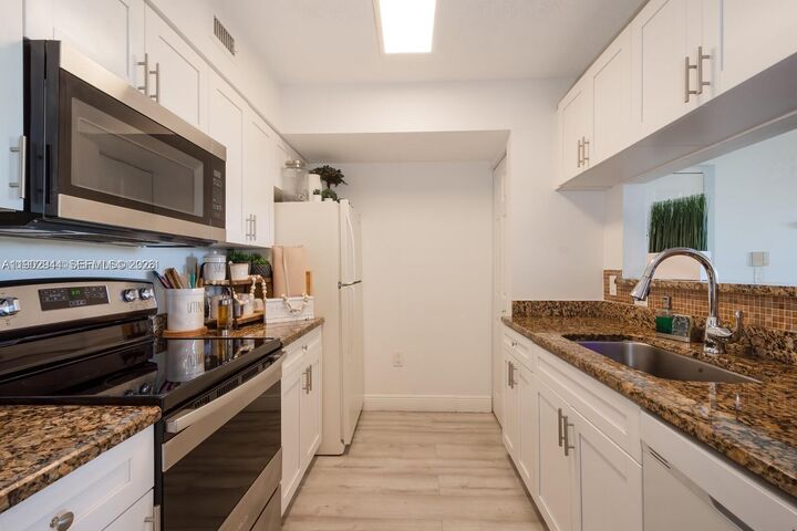 Property Photo:  12160 Saint Andrews Pl 108  FL 33025 