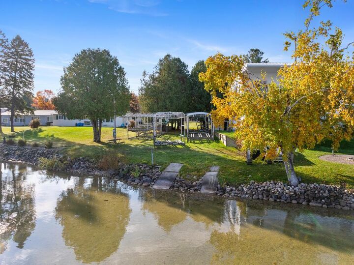 Property Photo:  3079 Parrotts Pointe  MI 49749