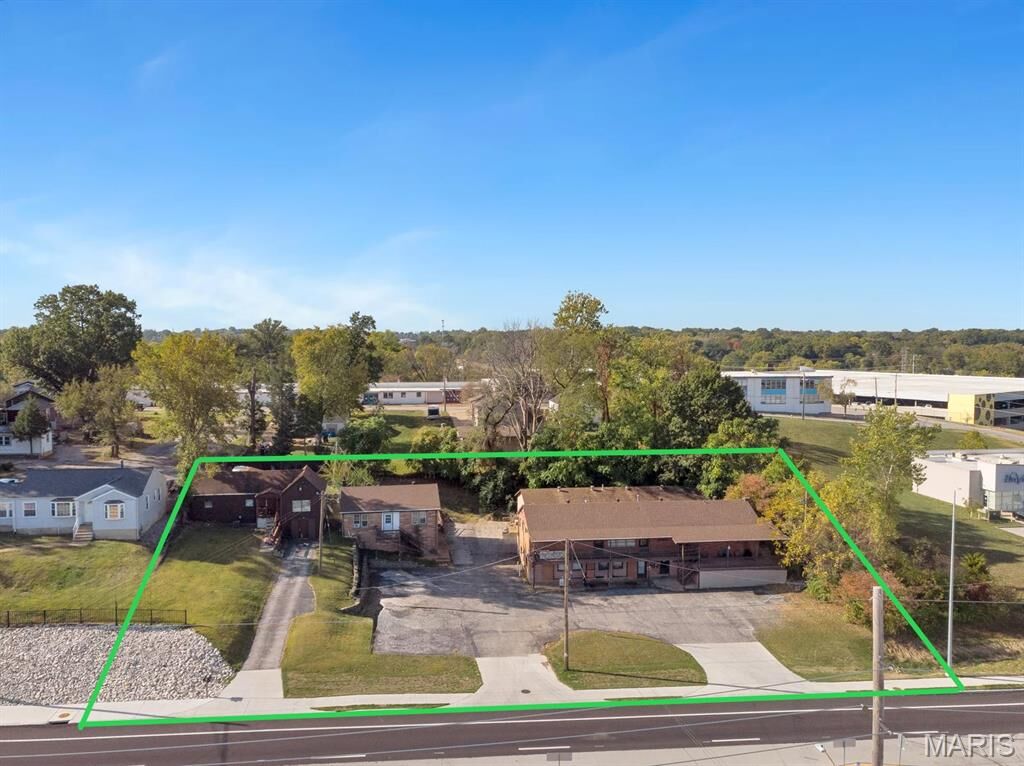 Property Photo:  8950 Natural Bridge Road  MO 63121