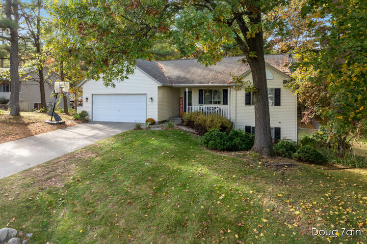 Property Photo:  7282 Mid Timber Drive  MI 48838 