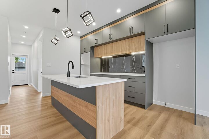 Property Photo:  9009 153 Street NW  AB T5R 1P4